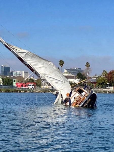 With her cabin flooded in the rising tide, this abandoned vessel is now awaiting removal from the estuary.