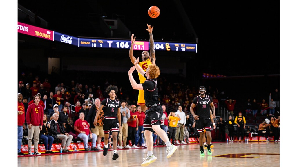 Troy plays another OT game, 43 minutes with the flu, and New Mexico's punch