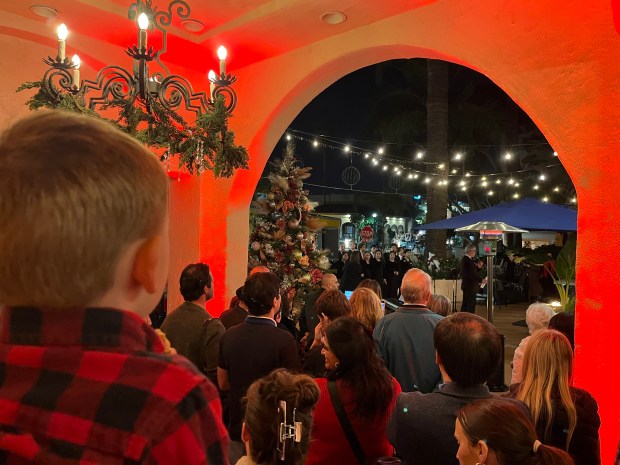 A young visitor looks on during the La Valencia Hotel's holiday festivities in 2024. (Noah Lyons)