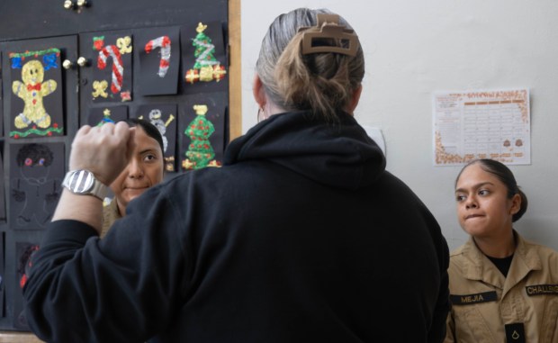 Sarah Schol, coordinator for the Female and Male Leadership Academy,...