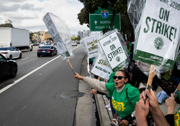 Workers with AFSCME Local 3299 began their two-day strike at...
