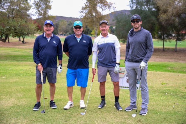 The foursome of Hugh Blackwood, Jim Hill, Denise Poland and...