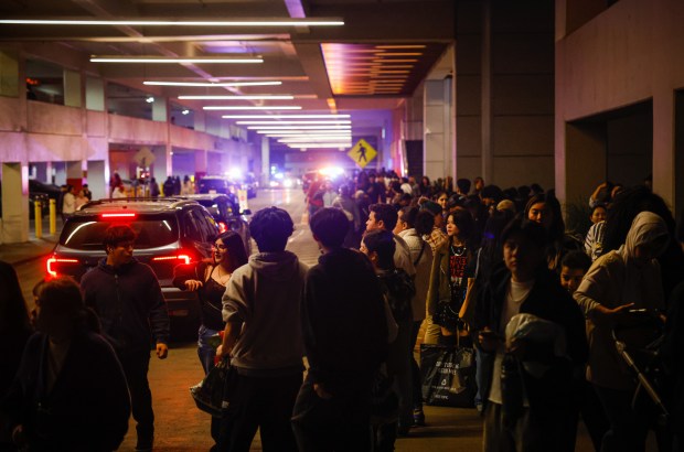 People leave Valley Fair as police investigate a shooting incident...