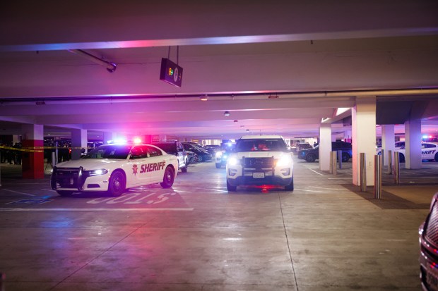 Police investigate a shooting incident at Valley Fair in San...