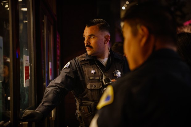 Police investigate a shooting incident at Valley Fair in San...