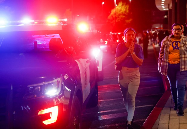 People leave Valley Fair as police investigate a shooting incident...