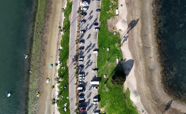 The city is looking at adding fees to park at lots in the beach areas and Mission Bay Park, seen here on Nov. 5, 2025 in San Diego, CA. (K.C. Alfred / The San Diego Union-Tribune)