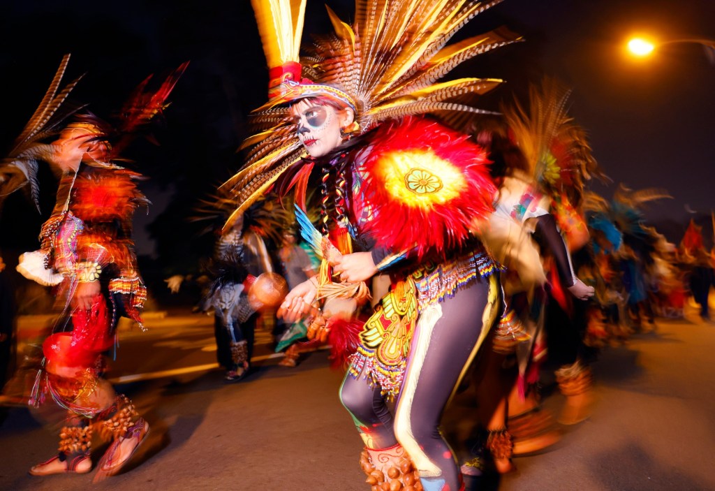 Families honor the dead at Día de los Muertos ceremony first started in Sherman Heights 31 years ago