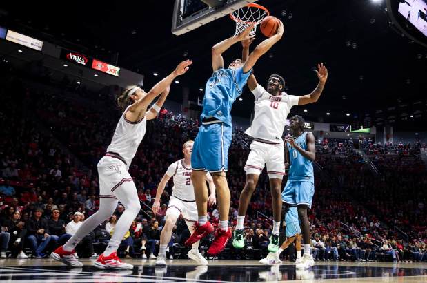 SDSU's Miles Heide shoots inside against Troy on Tuesday night at Viejas Arena. (Meg McLaughlin / The San Diego Union-Tribune)