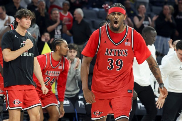 LAS VEGAS, NEVADA - NOVEMBER 25: Reese Dixon-Waters #39 of the San Diego State Aztecs celebrates at the end of the first half of a Players Era Championship Tournament game against the Oregon Ducks at Michelob ULTRA Arena on November 25, 2025 in Las Vegas, Nevada.  (Photo by Ian Maule/Getty Images)
