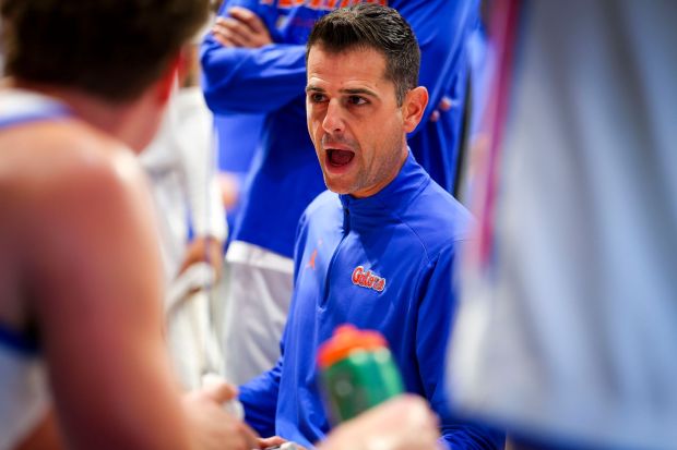 Florida coach Todd Golden talks to his players during the 2025 Rady Children's Invitational game against TCU at the Jenny Craig Pavilion on Thursday, Nov. 27, 2025 in San Diego, California. (Meg McLaughlin / The San Diego Union-Tribune)