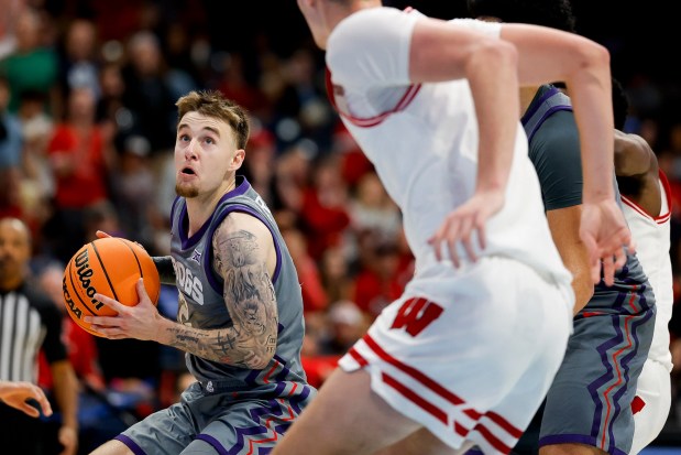 Brock Harding #2 of TCU drives to the basket against Wisconsin during the Rady Children's Invitational championship game at Jenny Craig Pavilion on Friday, Nov. 28, 2025 in San Diego, California. (Meg McLaughlin / The San Diego Union-Tribune)