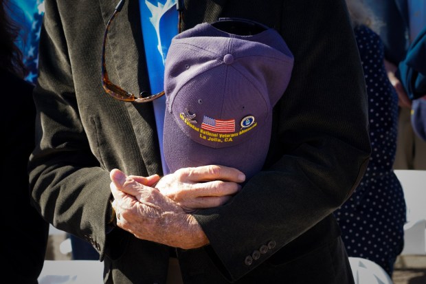 During the Veterans Day ceremony at the Mt. Soledad National Veterans Memorial on Saturday, Nov. 8, 2025, in San Diego, veterans stood to be recognized for their military service. (Nelvin C. Cepeda / The San Diego Union-Tribune)