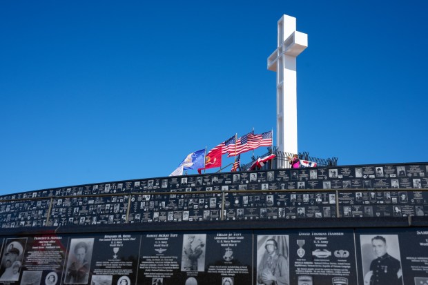 Immediately following the Veterans Day ceremony at the Mt. Soledad National Veterans Memorial on Saturday, Nov. 8, 2025, in San Diego, Katheryn Anthony of La Jolla enjoyed walking and taking photos of the memorial. (Nelvin C. Cepeda / The San Diego Union-Tribune)