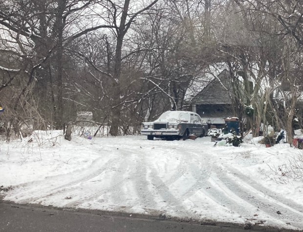 After 90 cubic yards of debris were removed, the elderly...