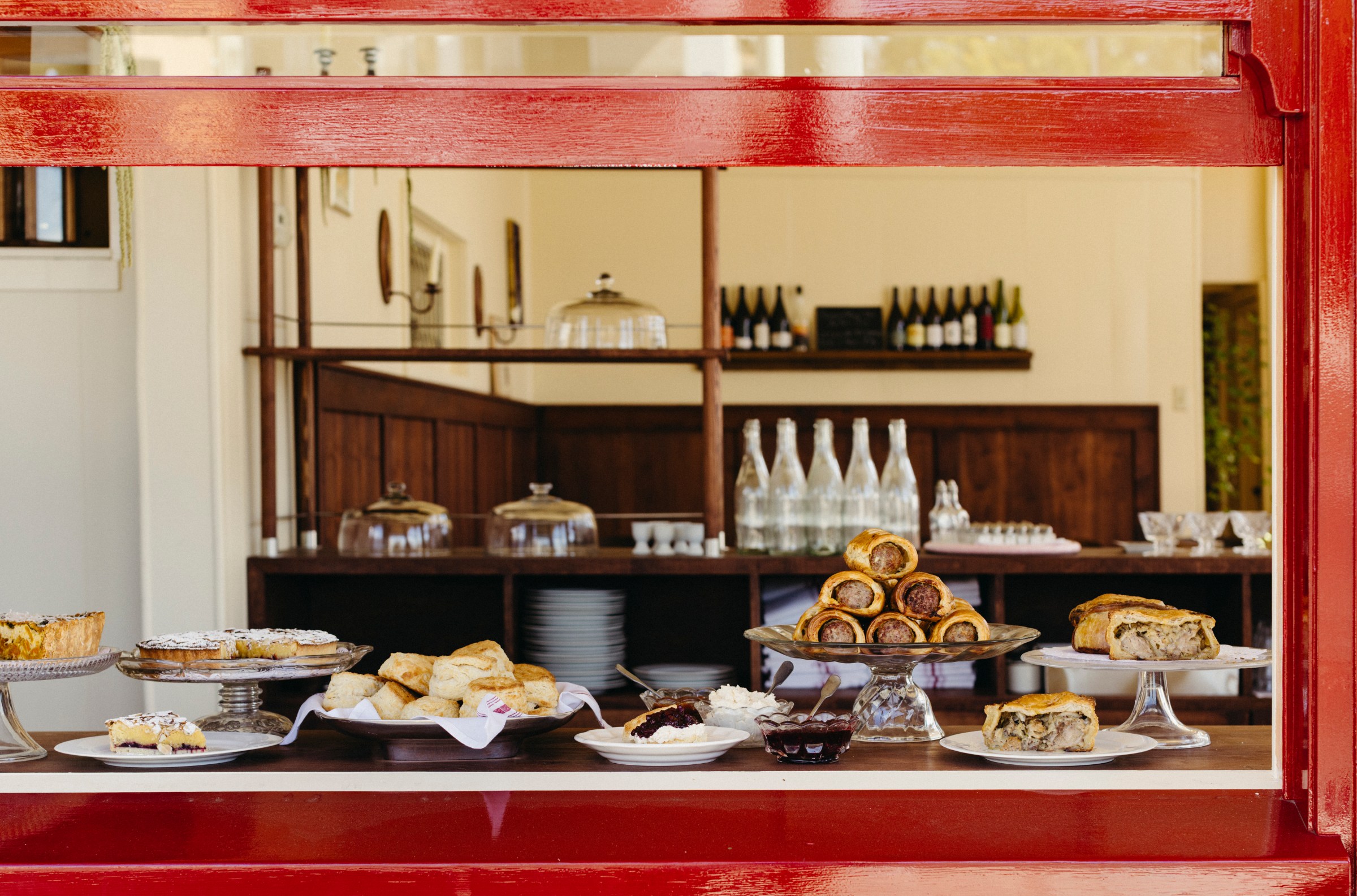 Sausage rolls and pastry in a window at Wilde’s