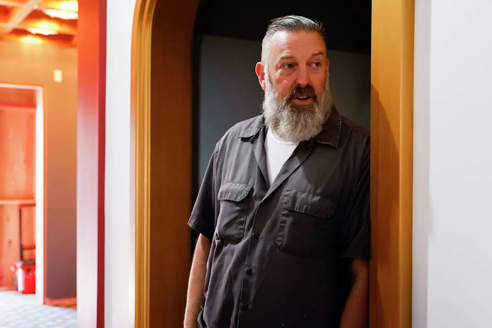 Adam Bergeron, the operator of the Vogue Theater in San Francisco, poses for a portrait in a file photo from Dec. 5, 2022. (Jessica Christian/The Chronicle)