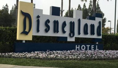 A large sign reads "Disneyland Hotel" in decorative lettering.