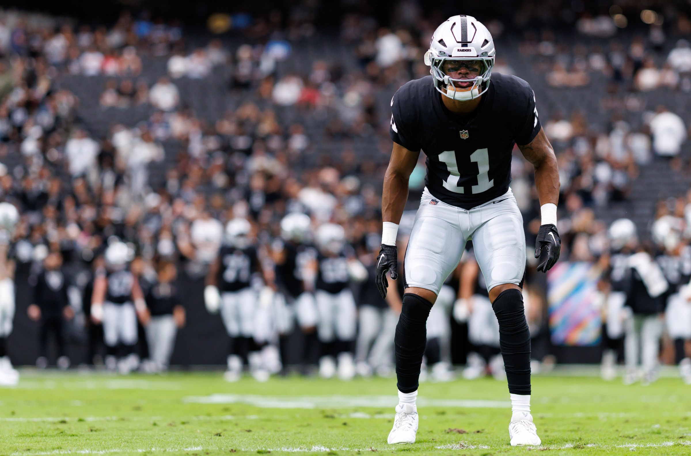 LAS VEGAS, NEVADA - OCTOBER 12: Jeremy Chinn #11 of the Las Vegas Raiders warms up prior to an NFL football game against the Tennessee Titans at Allegiant Stadium on October 12, 2025 in Las Vegas, Nevada. (Photo by Brooke Sutton/Getty Images)