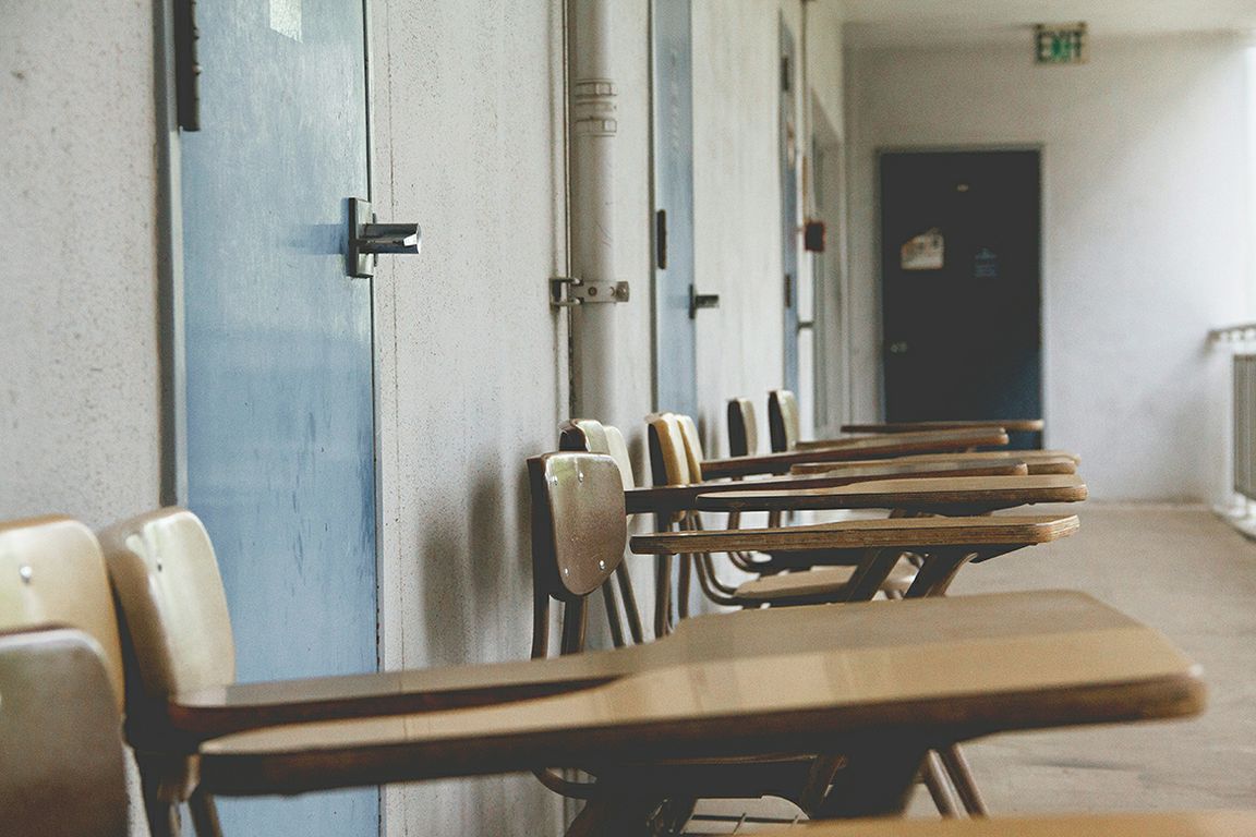 A row of empty school desks