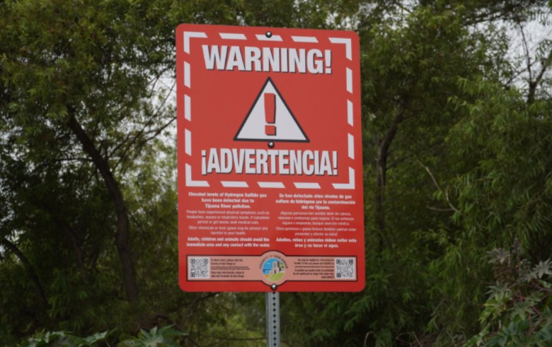 New red Tijuana River Valley warning signage.