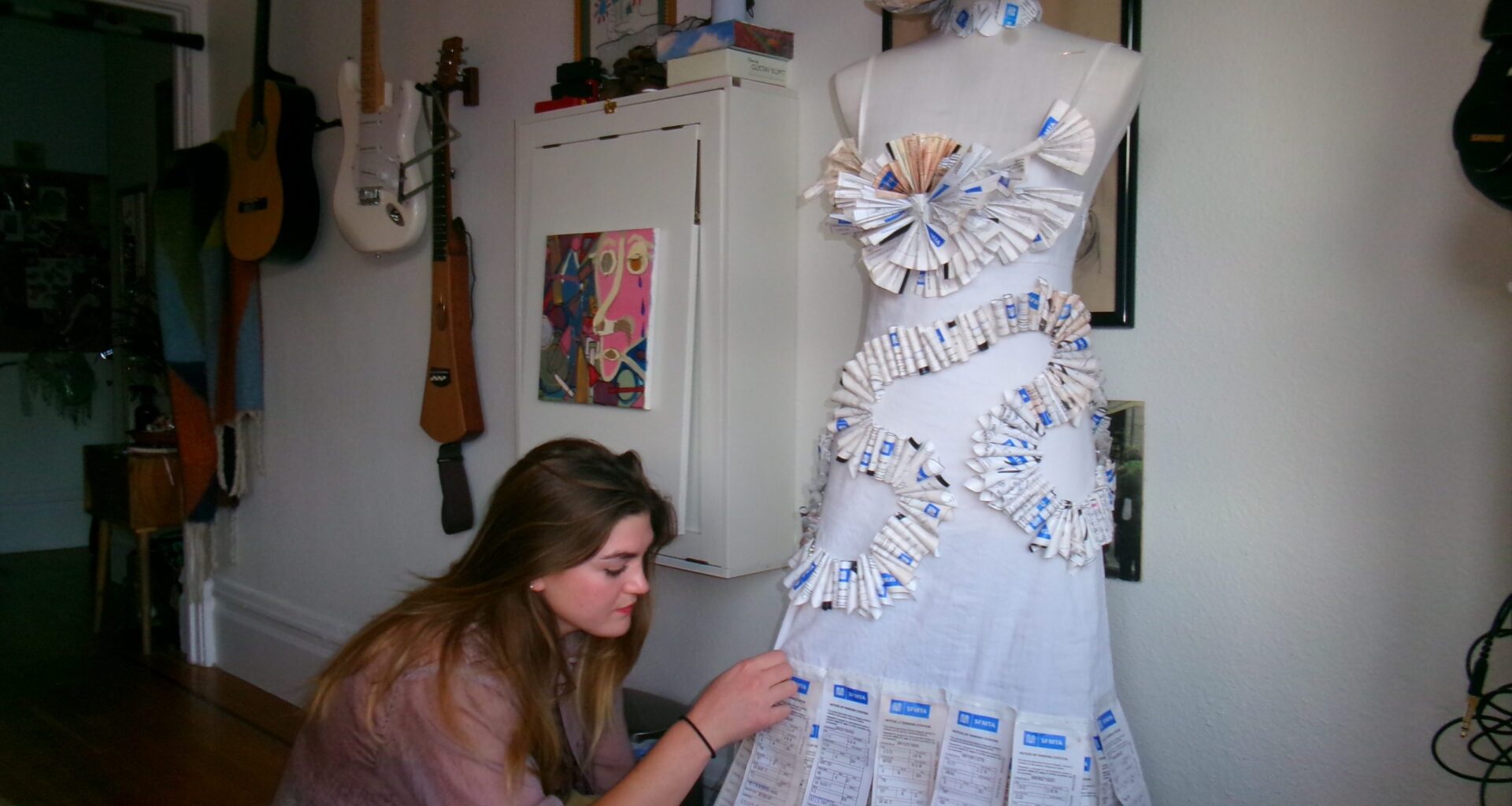 S.F. musician takes on SFMTA with a dress made of parking tickets