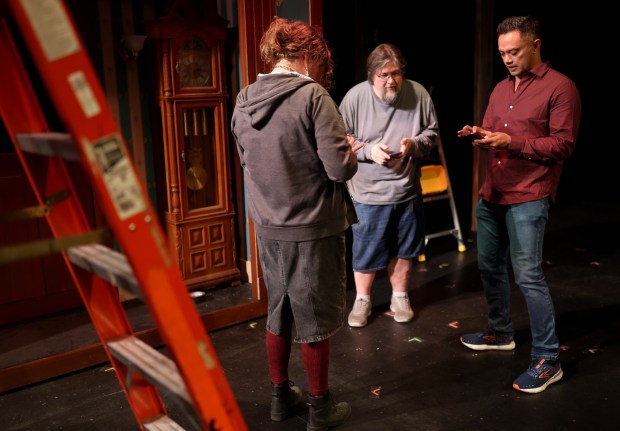 Director Kikau Alvaro works with crew members on the set during a rehearsal for "Finding Neverland" at the Montgomery Theater in San Jose, Calif., on Wednesday, Dec. 3, 2025. Alvaro is the new artistic director of Children's Musical Theater. (Jane Tyska/Bay Area News Group)