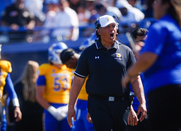 San Jose State's head coach Ken Niumatalolo speaks to the team on the field during a game against Idaho in the first quarter at CEFCU Stadium in San Jose, Calif., on Saturday, Sept. 20, 2025. (Shae Hammond/Bay Area News Group)