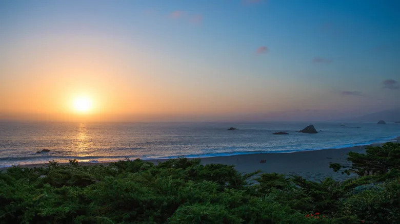 Rock stacks rise from the ocean in front of Wright's Beach, California