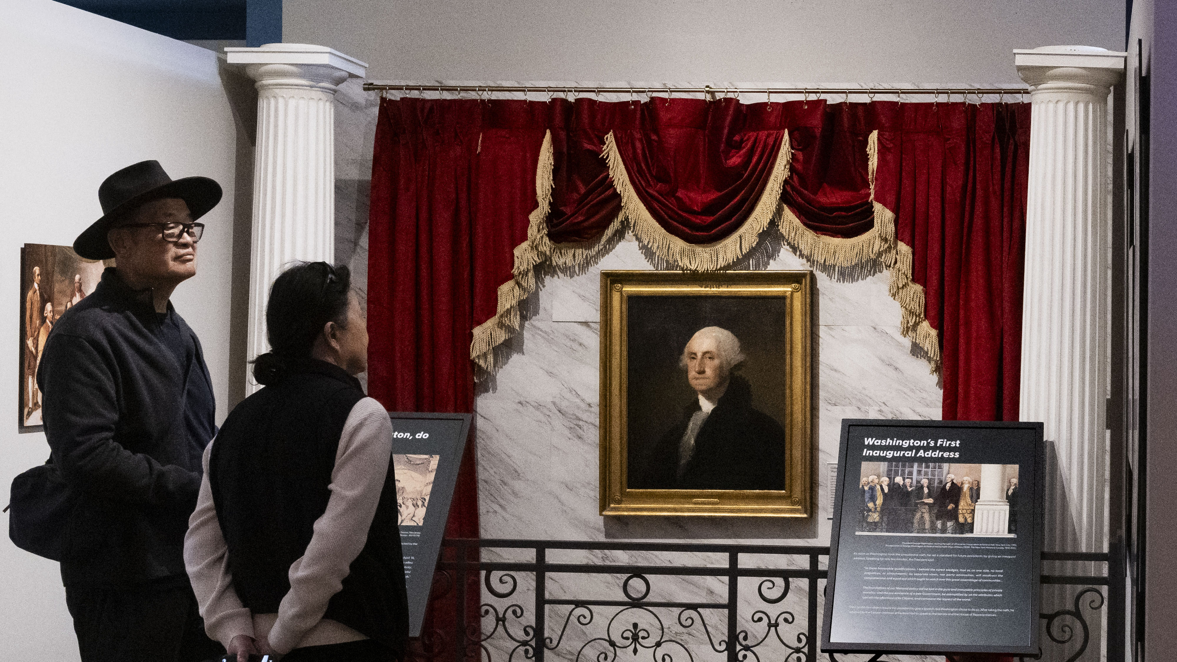 A couple tours the exhibit America 250, A More Perfect...