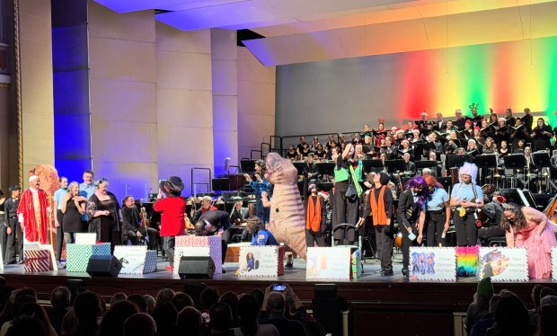 Inflatable dinosaurs, faux jewel thieves and a Pope Leo XIV impersonator were among the wild presenters for the "12 Days of Silicon Valley," a topical parody performed at Symphony San Jose's "Holiday Spectacular" at the California Theatre on Saturday, Dec. 6, 2025. (Sal Pizarro/Bay Area News Group)
