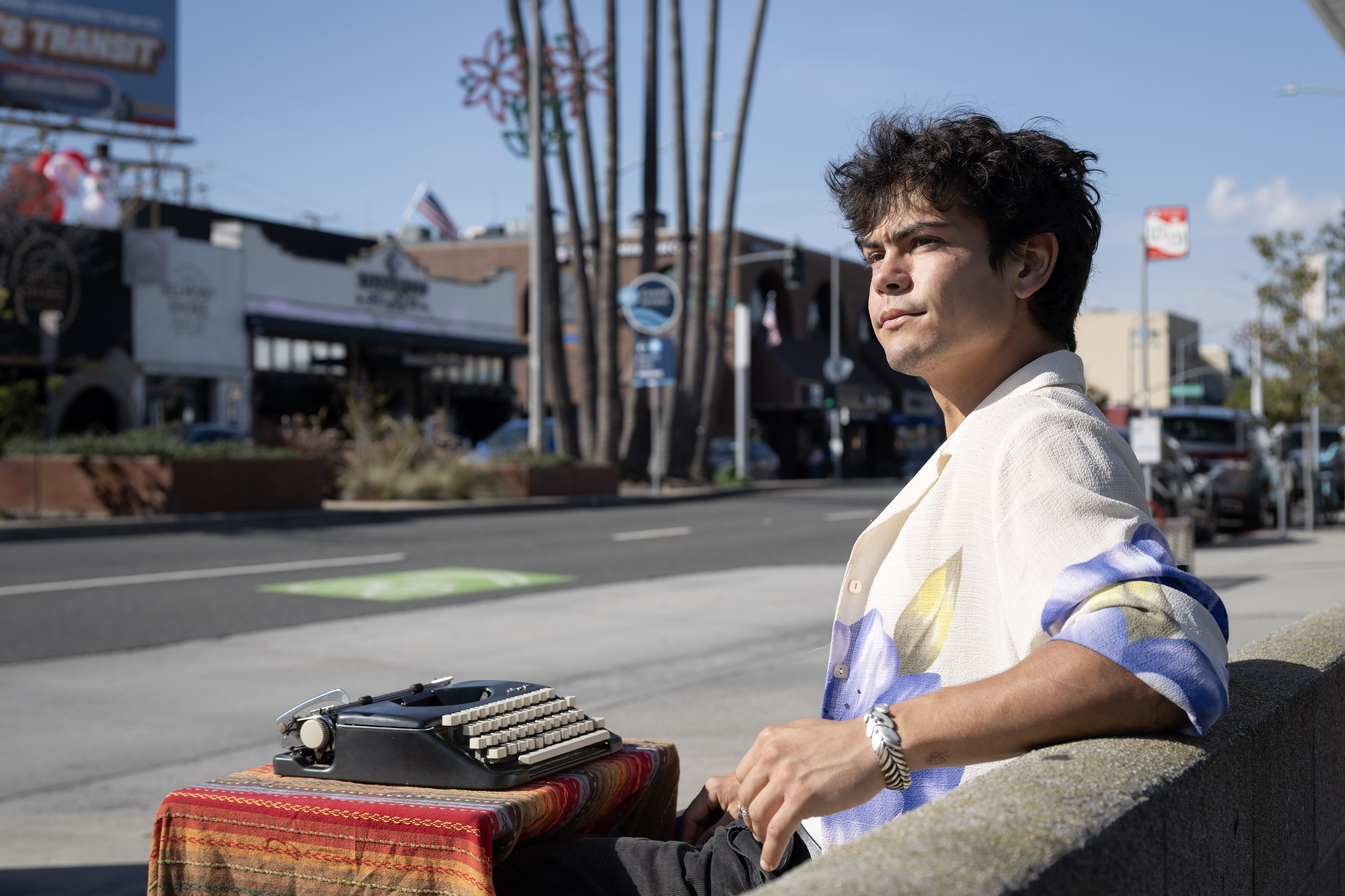 Street poet Nico Patino offers passerbys original poems on 2nd...