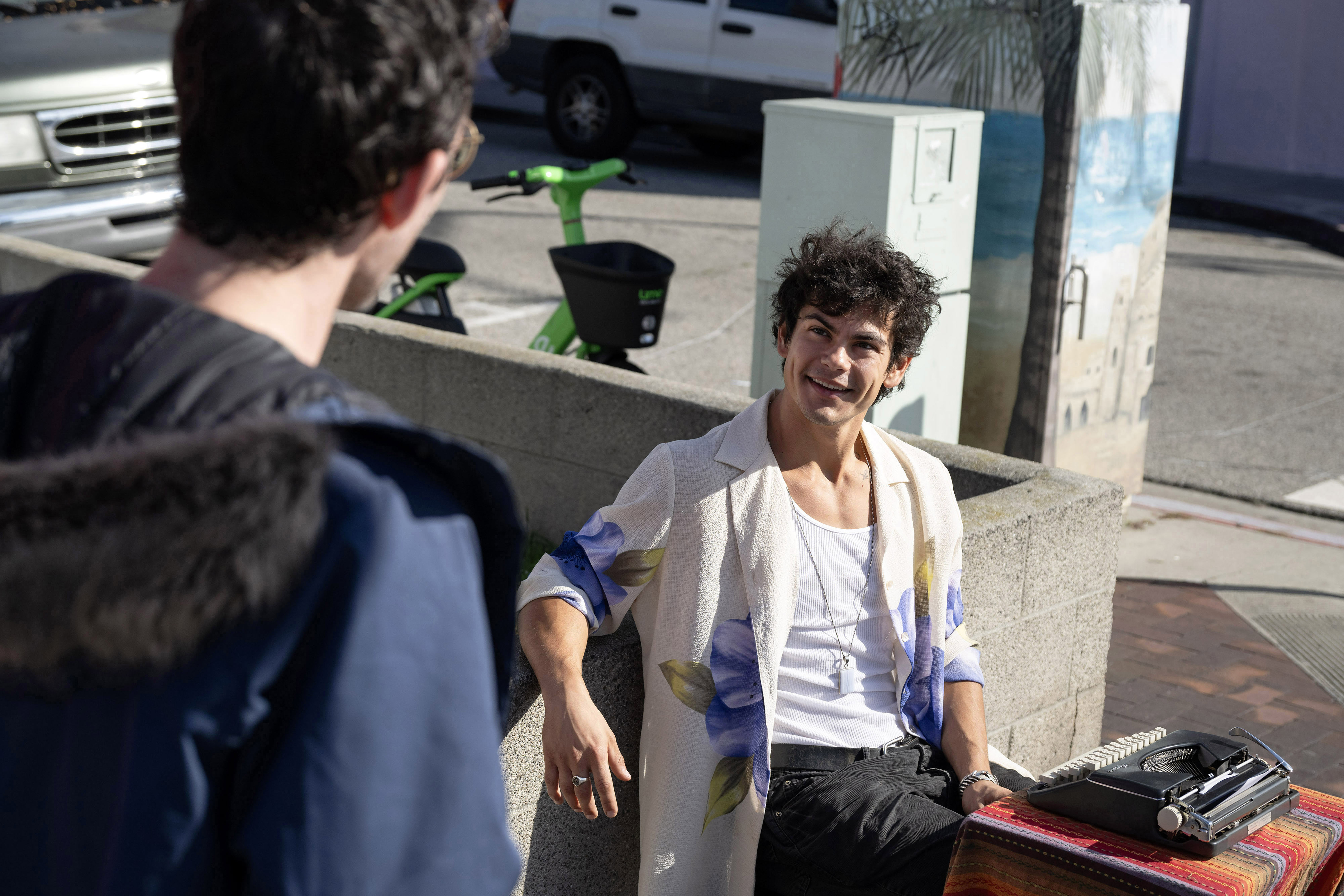 From right, street poet Nico Patino and Daniel Warren discuss...