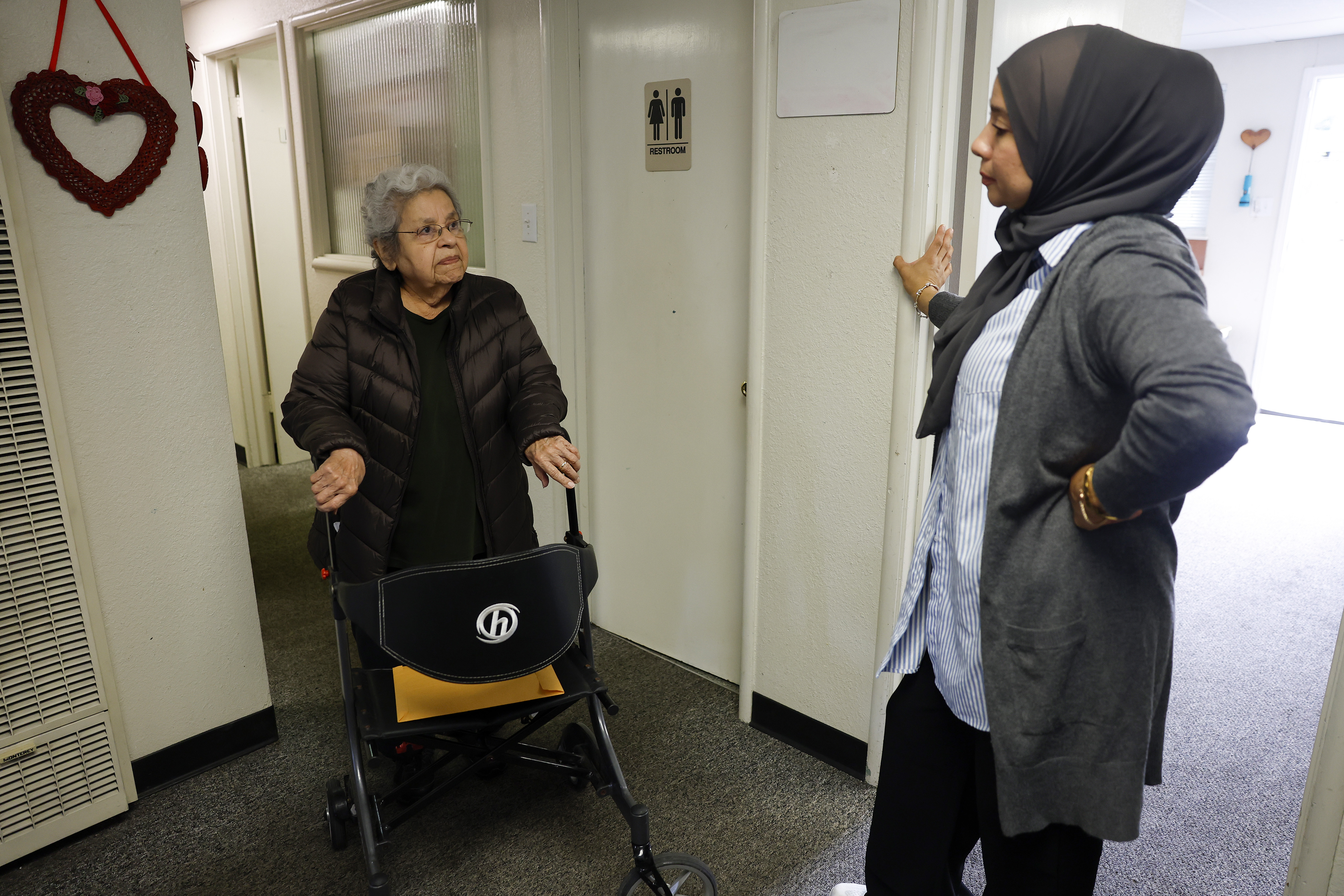 Lidia Donez, left, chats with Alma Soto, Executive Director of...