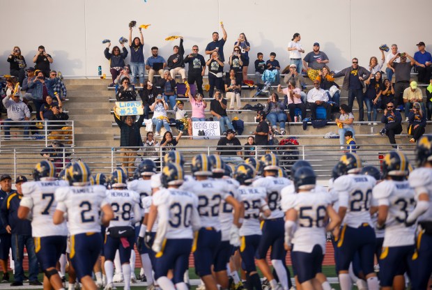 Lincoln's crowd cheers for them before Lincoln plays against Valley Center during Division 6-AA state football championship game at Fullerton Union High School District Stadium in Fullerton, Calif., on Friday, Dec. 12, 2025. (Shae Hammond/Bay Area News Group)