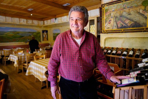 Michel Malecót, owner of The French Gourmet, says he plans to close the restaurant on Sunday, Jan. 4. (Nelvin C. Cepeda / The San Diego Union-Tribune)