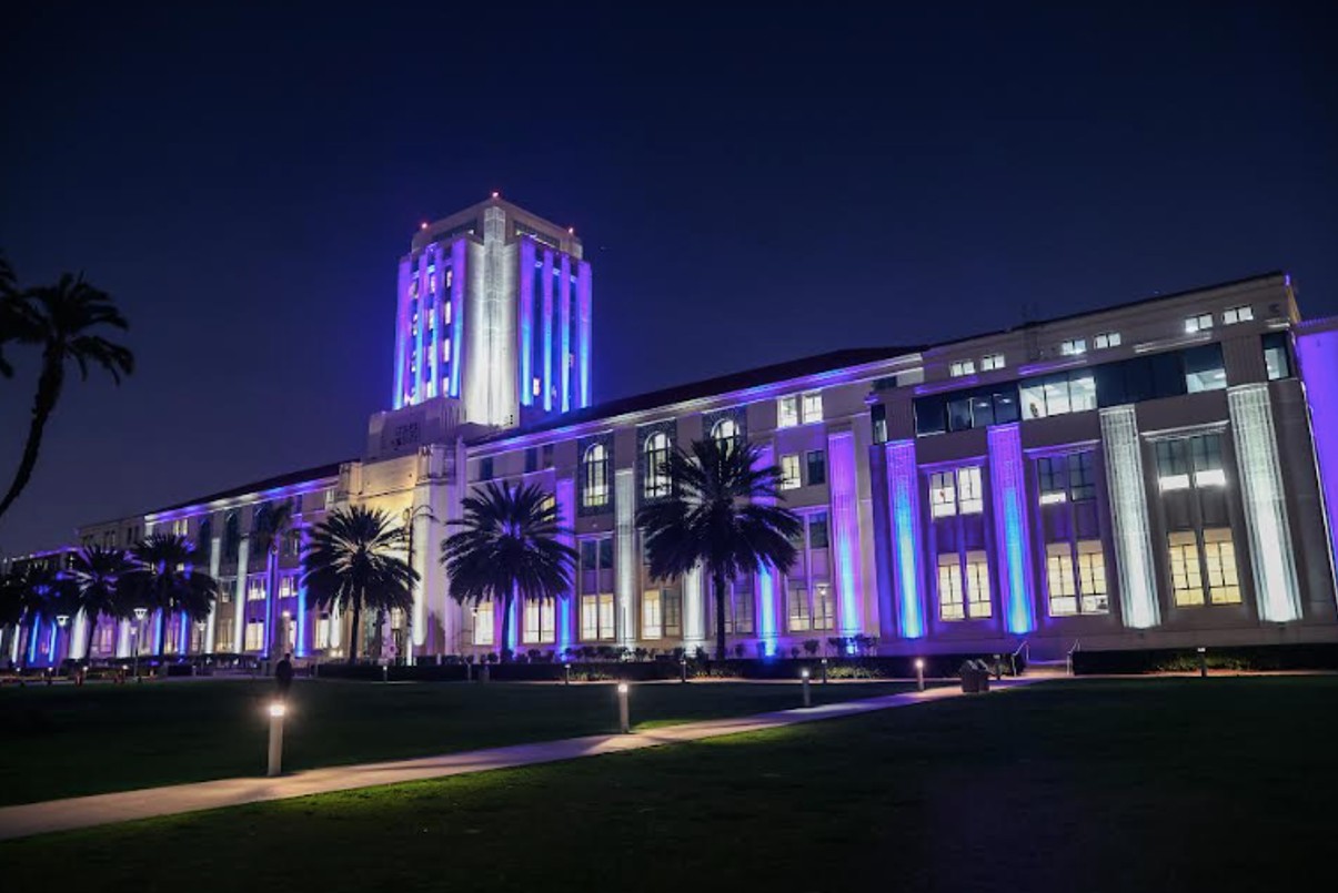 Historic county building lit in blue and white to honor Sydney victims