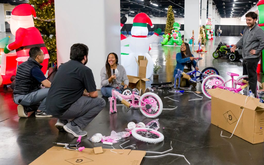 Families Together and volunteers play elves to make giant toy giveaway magic – Orange County Register