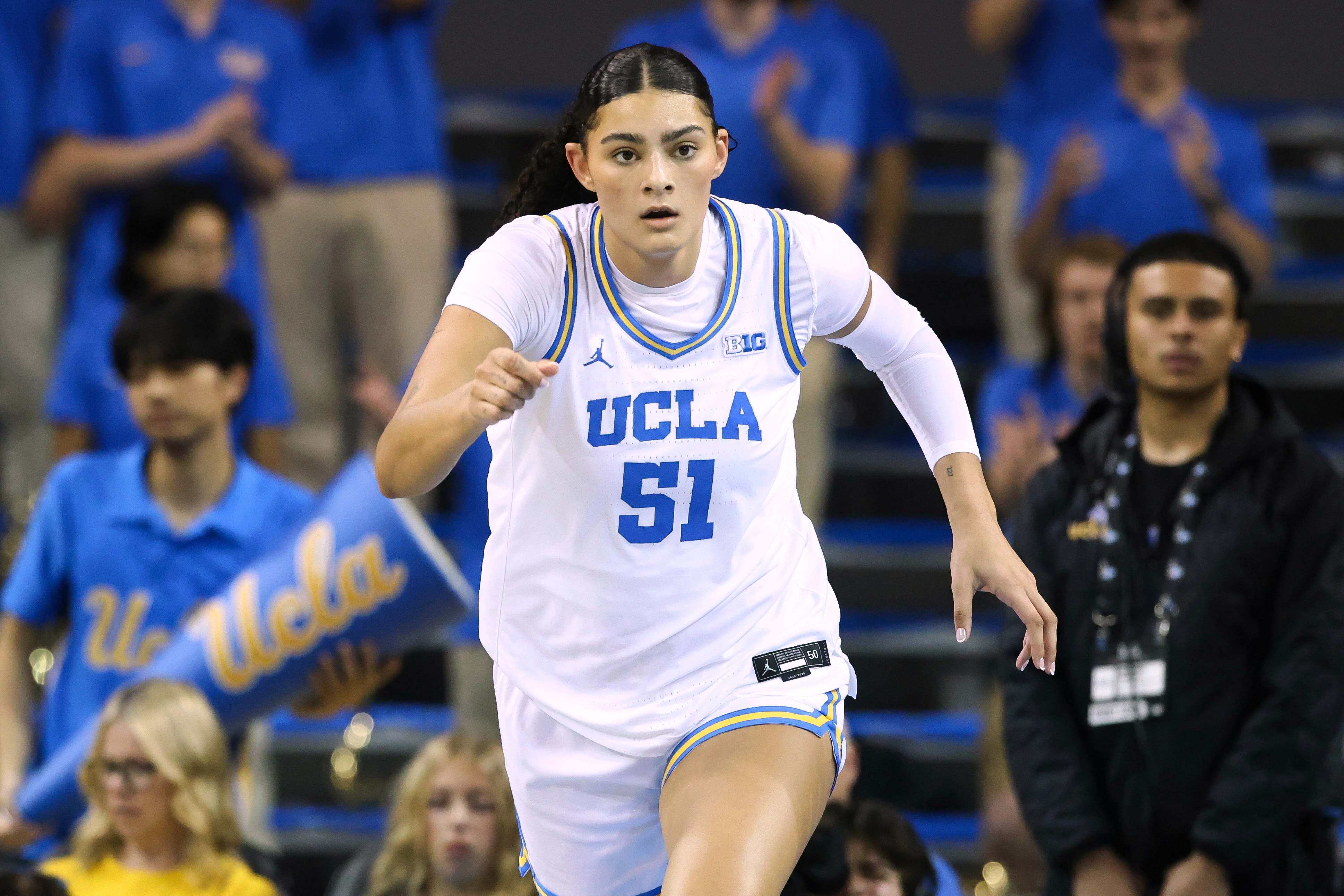 UCLA center Lauren Betts (51) reacts after scoring a basket...