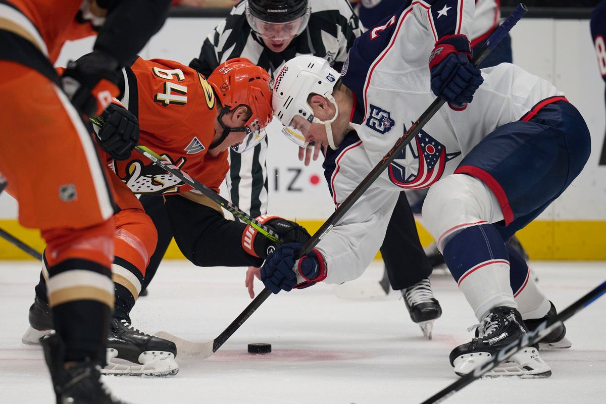 Mikael Granlund #64 of the Anaheim Ducks does a face off against the Blue Jackets at the Honda Center on December 20,2025 in Anaheim, California.