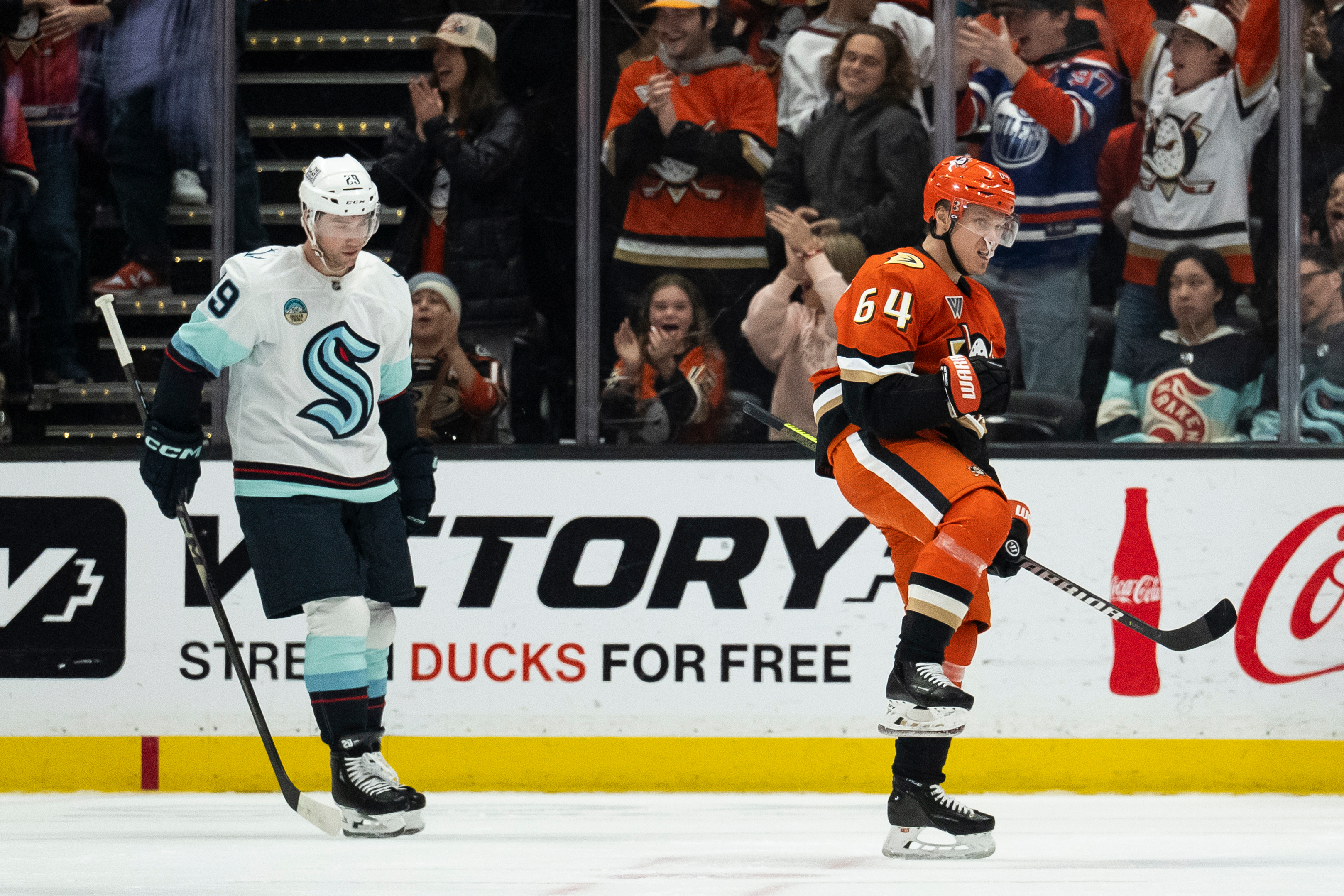 Ducks center Mikael Granlund, right, celebrates after his goal during...