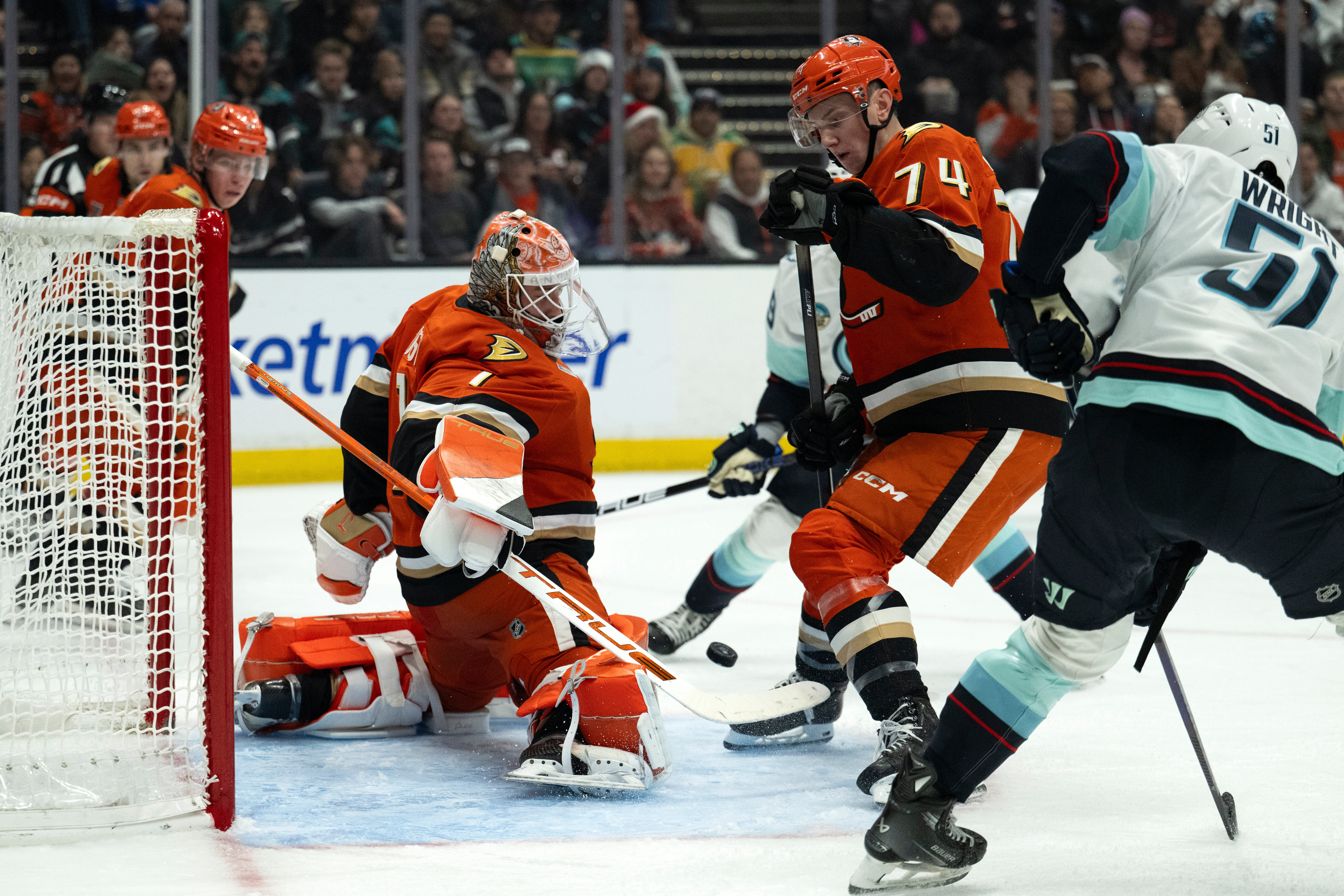 Ducks goaltender Lukas Dostal (1) blocks a shot by Seattle...