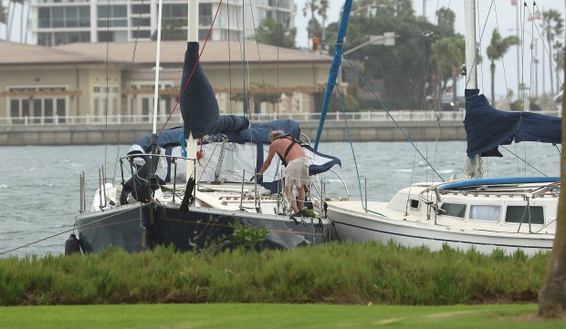 Two sailboats dragged anchor in Glorietta Bay by the Coronado Golf Course. (John Gastaldo / For The San Diego Union-Tribune)
