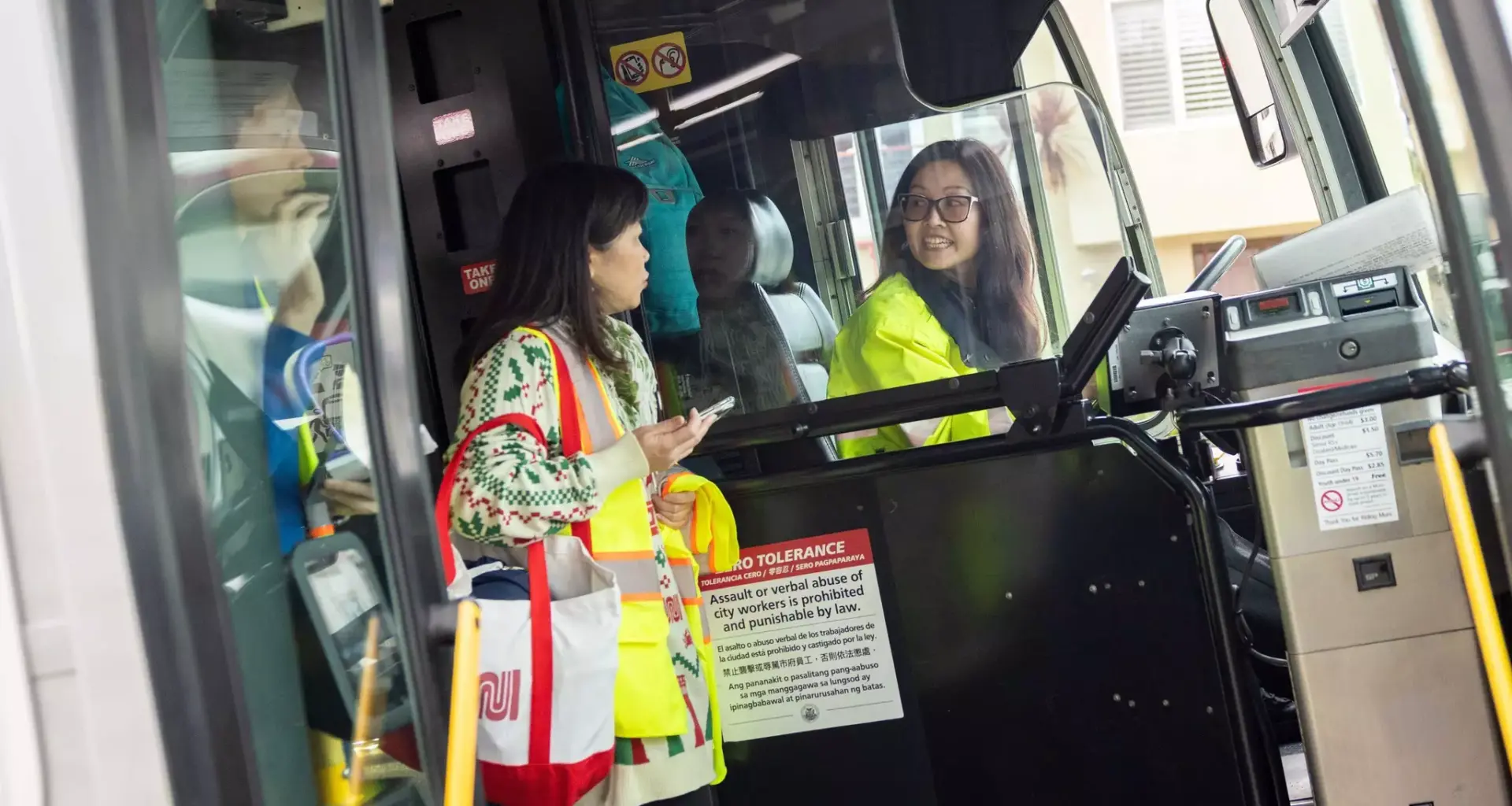 A collage of nine images: an abstract U.S. flag with tech icons, a policewoman driving, a cyclist in a field, a crowd protest, a large red building, a torn photo of a couple, a suburban house with a palm tree, two basketball players celebrating, and a cartoon drag show.