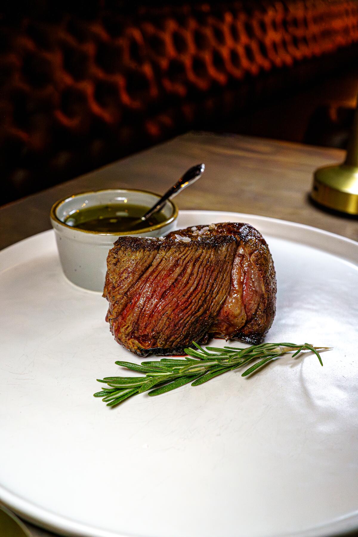 Filet mignon at Westwood Coast, which also offers live country music and dancing on New Year's Eve.