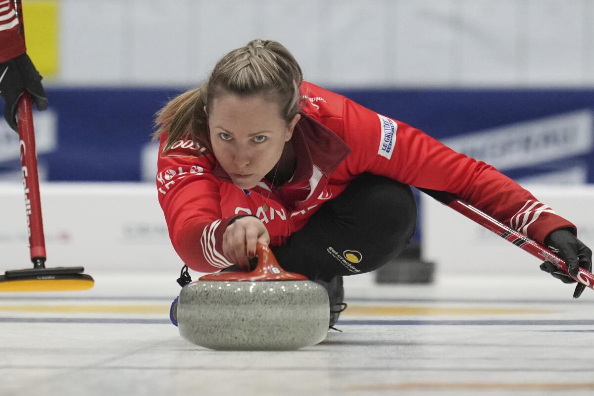 Canada's skip Rachel Homan releases a stone during a match at the World Women's Curling Championship.