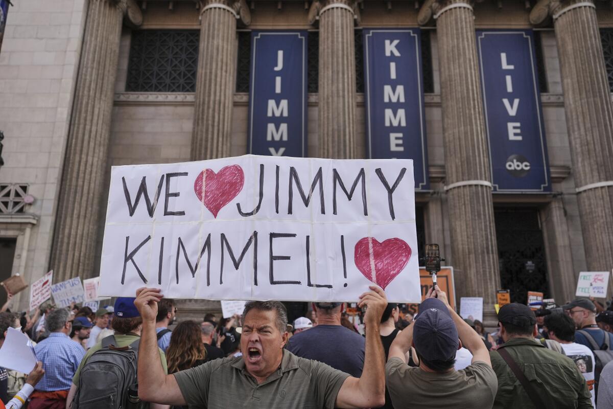 A crowd of supporters gather outside the building where "Jimmy Kimmel Live" is staged
