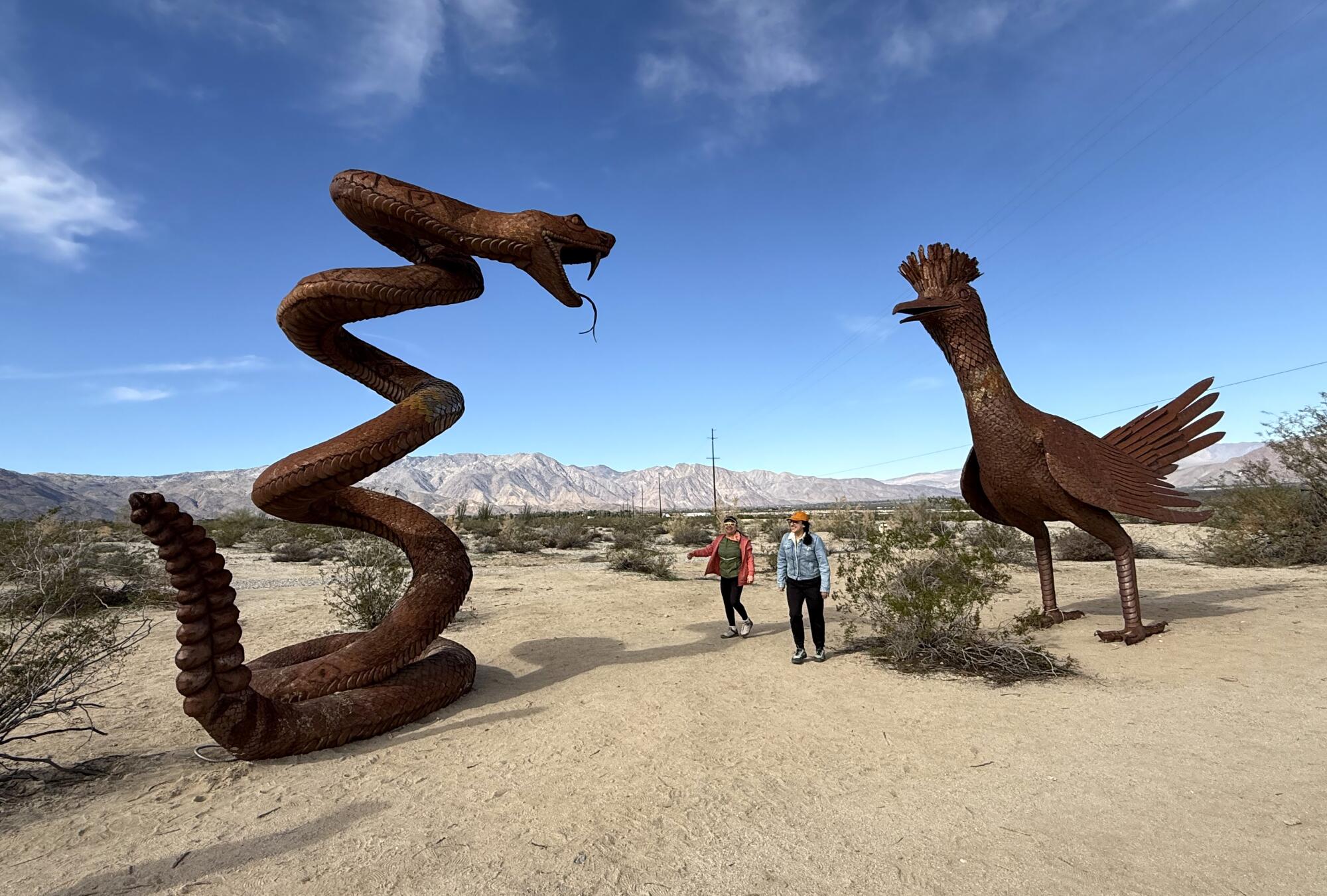 Two recently added metal sculptures by Ricardo Breceda, a rattlesnake and a roadrunner.