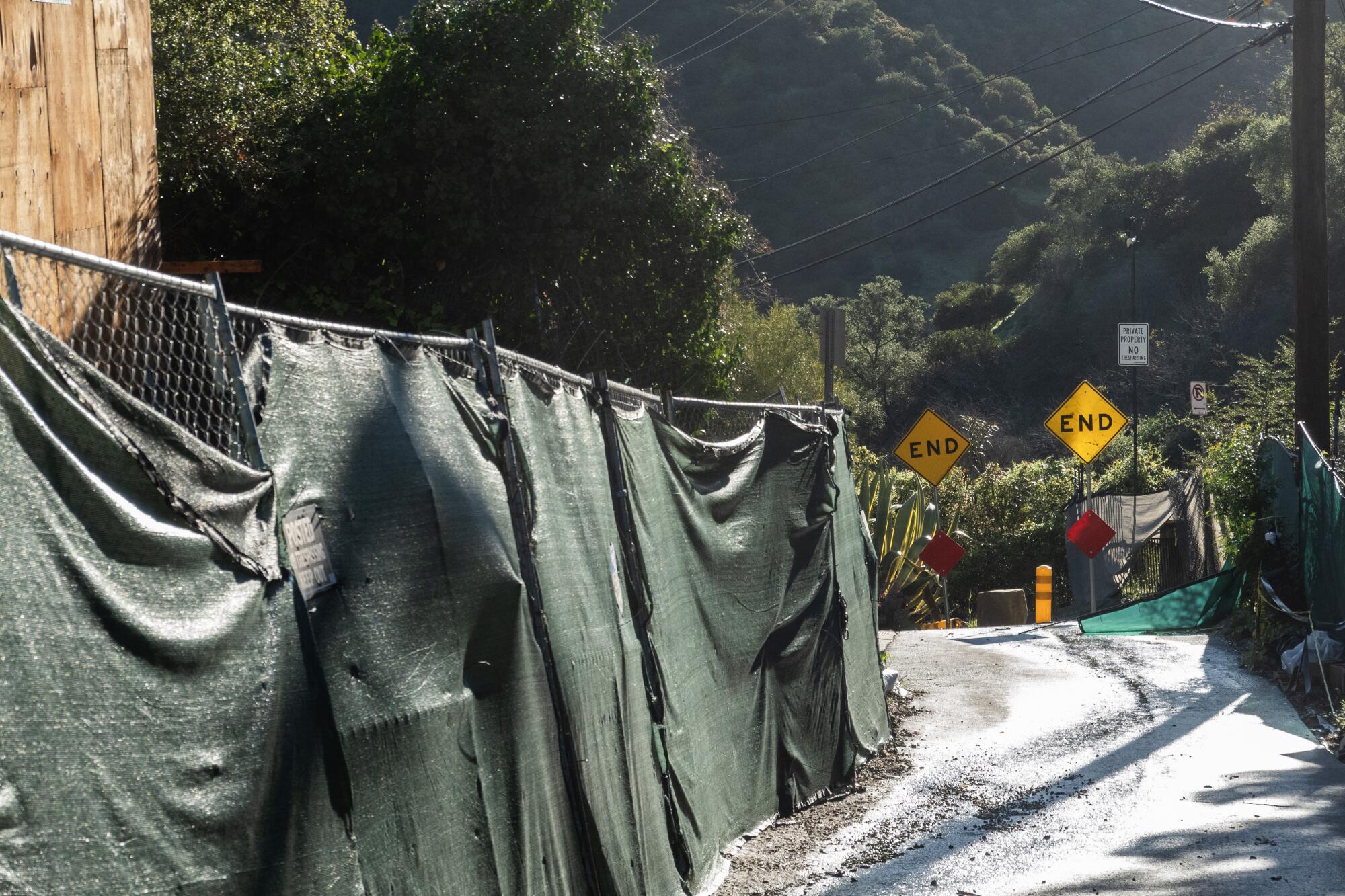A single-family home under construction on Sandal Lane with "END" signs marking a dead-end in the background
