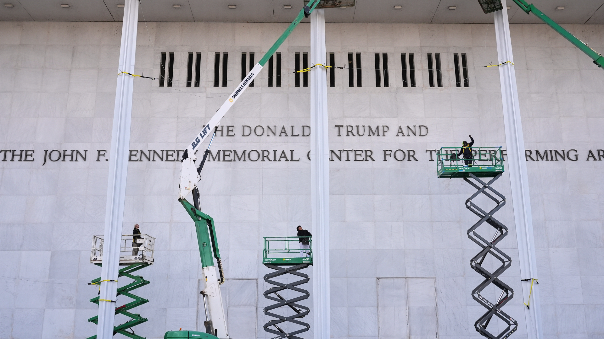 FILE - New signage, The Donald J. Trump and The John F. Kennedy Memorial Center For The Performing Arts, is unveiled on the Kennedy Center, Friday, Dec. 19, 2025, in Washington.